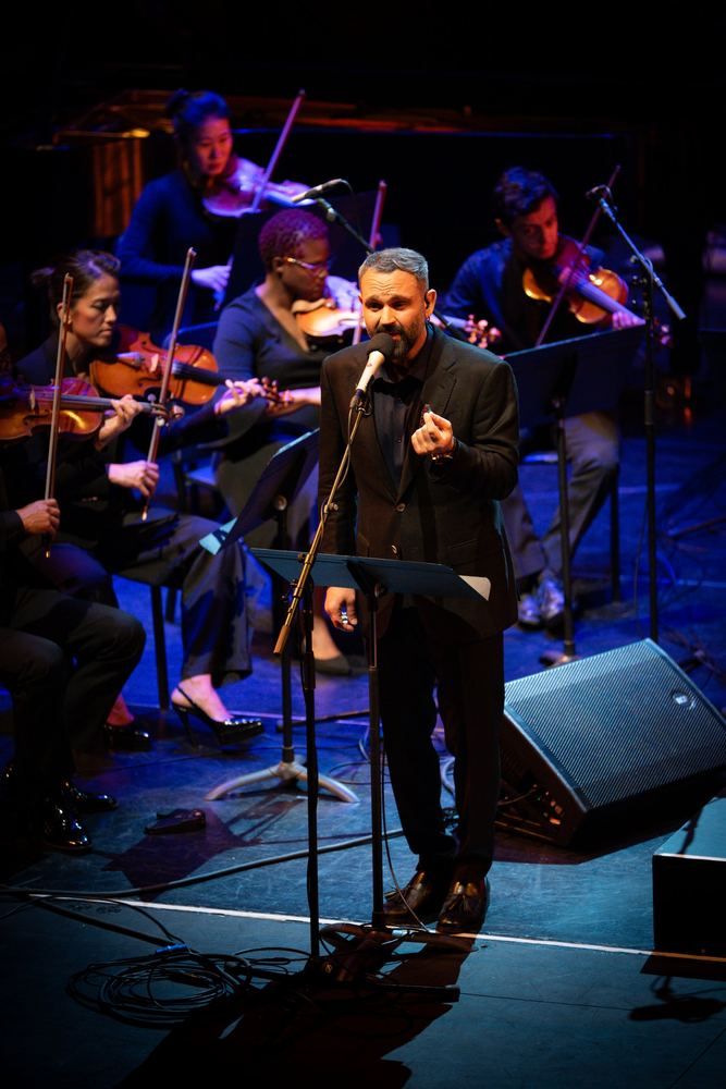 Milad Bagheri performing with string players
